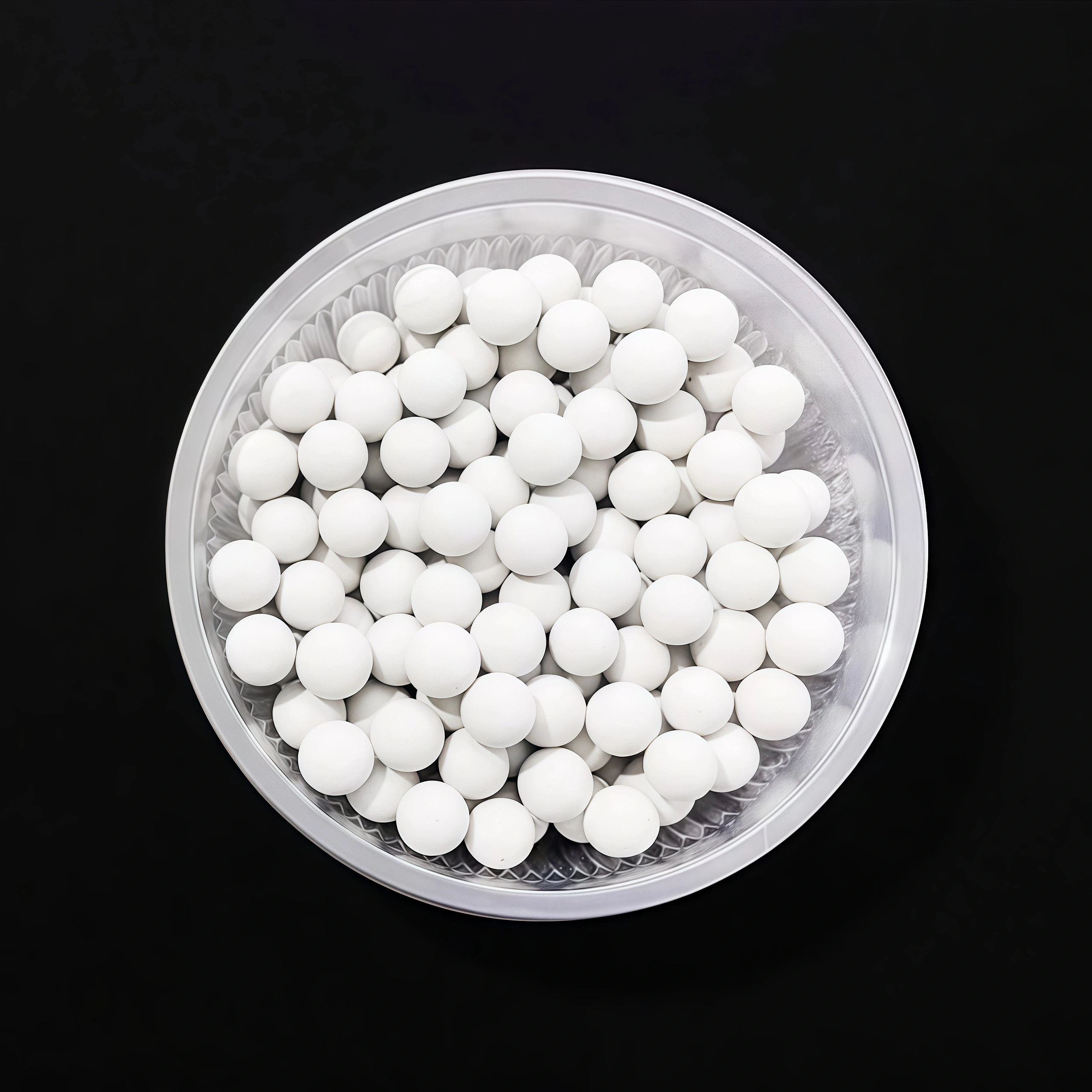 Spherical activated alumina desiccant balls used in pressure swing adsorption