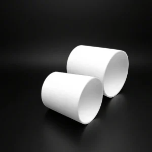 A custom beryllium oxide crucible is shown for vacuum and inert heating applications.