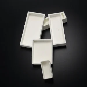 High-temperature crucible for rare earth oxide processing