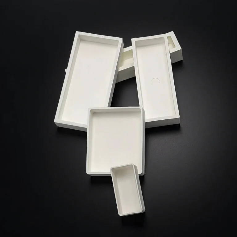 High-temperature crucible for rare earth oxide processing