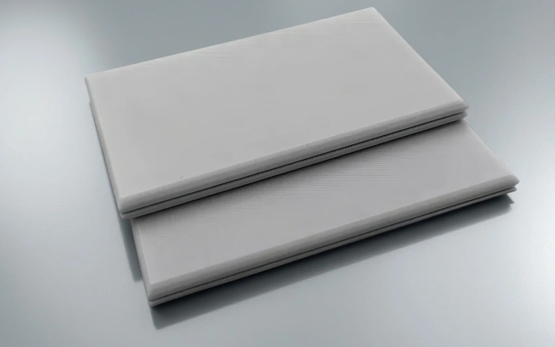 Custom aluminum nitride ceramic plate with defined thickness and tight dimensional tolerances for power electronics