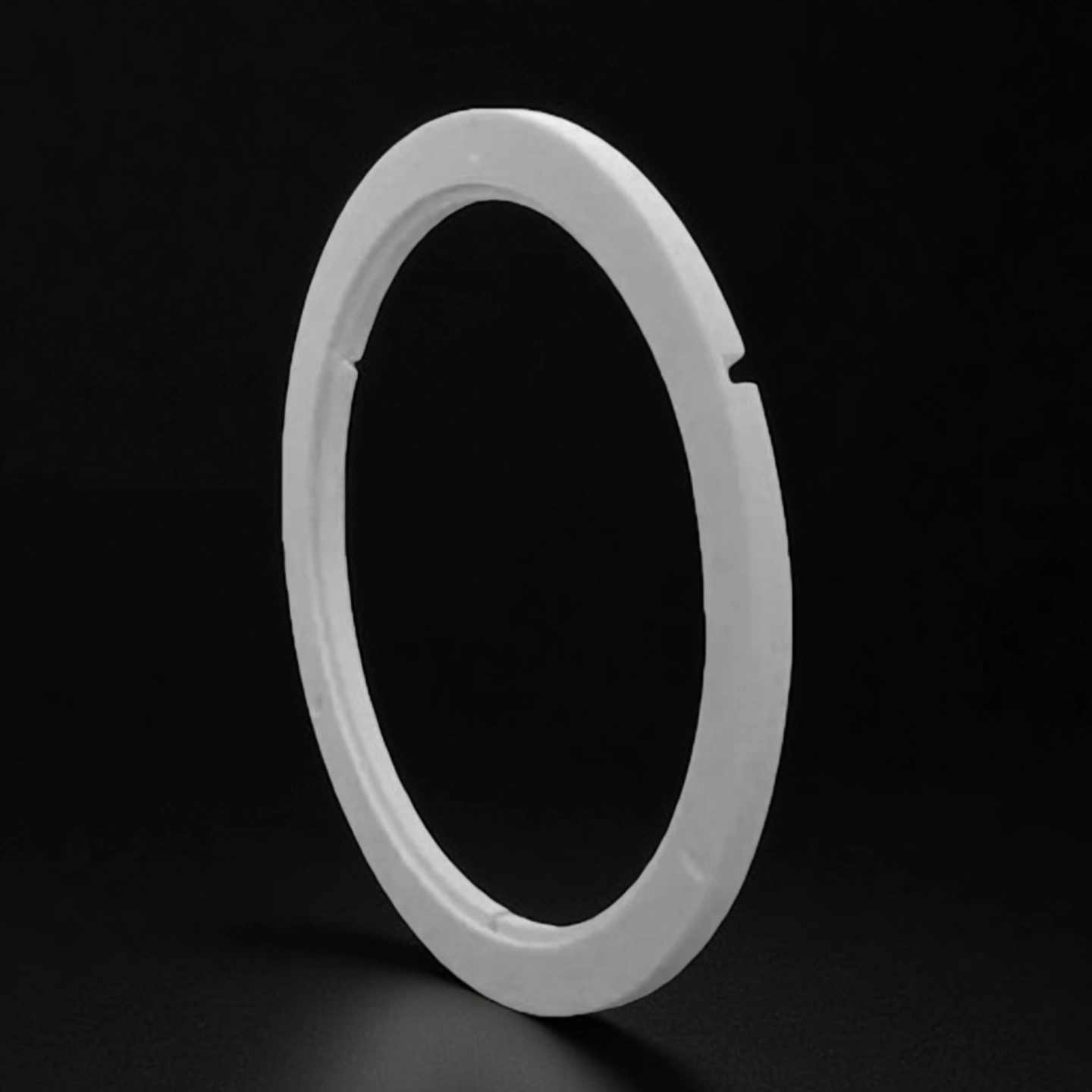 Ceramic edge ring with step profile and edge chamfer for boundary control in a vacuum process chamber