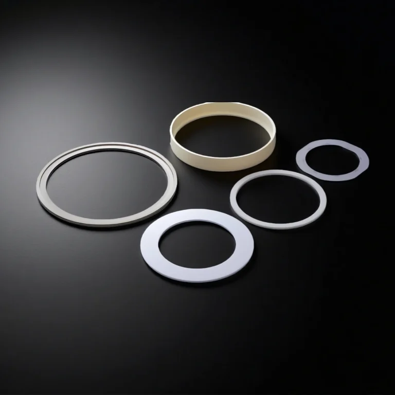 ceramic focus ring seating face with controlled flatness and surface roughness Ra