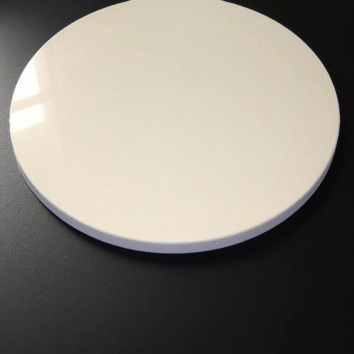 Alumina ceramic grinding disc mounted on precision lapping machine table