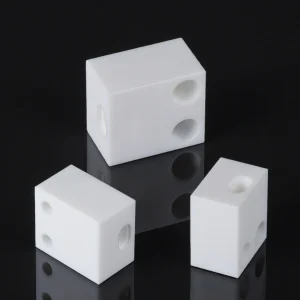 Machinable glass ceramic mounting plate with threaded holes and slots for optical and laser equipment