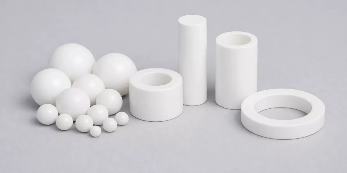 White zirconia ceramic components highlighting wear related degradation characteristics White zirconia ceramic components highlighting wear related degradation characteristics