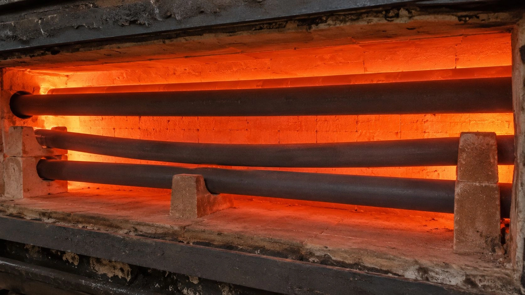 SiC silicon carbide tube creep resistance 1400C load horizontal furnace tube support span deformation sag high temperature