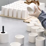 Post-firing inspection of alumina crucibles before packing