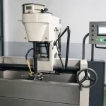 A clean ceramic machining workstation shows industrial equipment used for processing custom ceramic components.