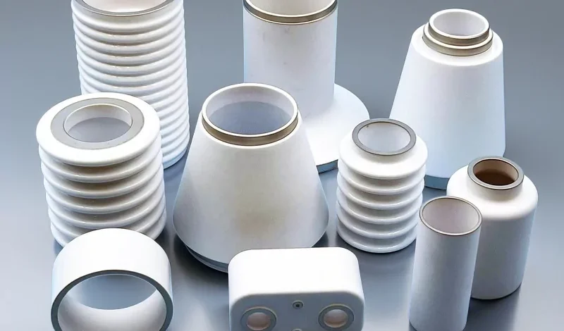 Custom metallized alumina ceramic components — tubes, feedthrough bodies and rings with Mo-Mn metallization and Ni/Au plating for ceramic-to-metal sealing — ADCERAX