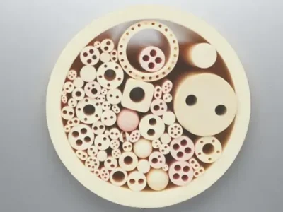 Ceramic tubes and rods showing different bore patterns