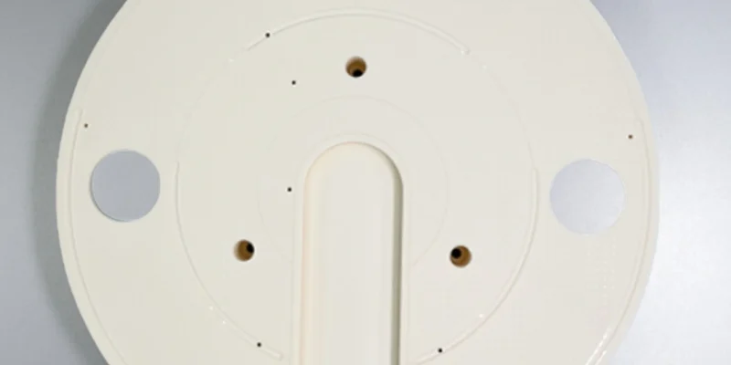 Porous alumina vacuum chuck table used to clamp multiple glass components for polishing