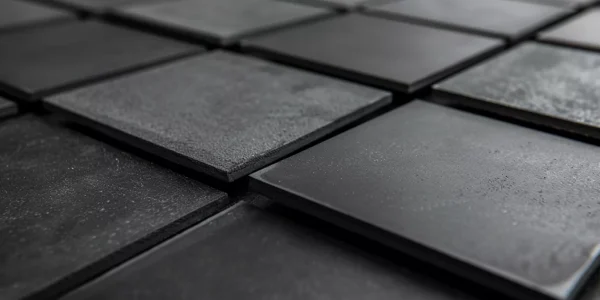 boron carbide ceramic plates protecting abrasive zones in energy processing systems